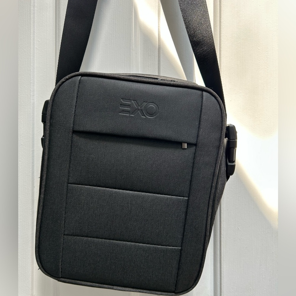EXO Padded Men's Black Crossbody Bag. Protection for what you carry. 11x8.5”.